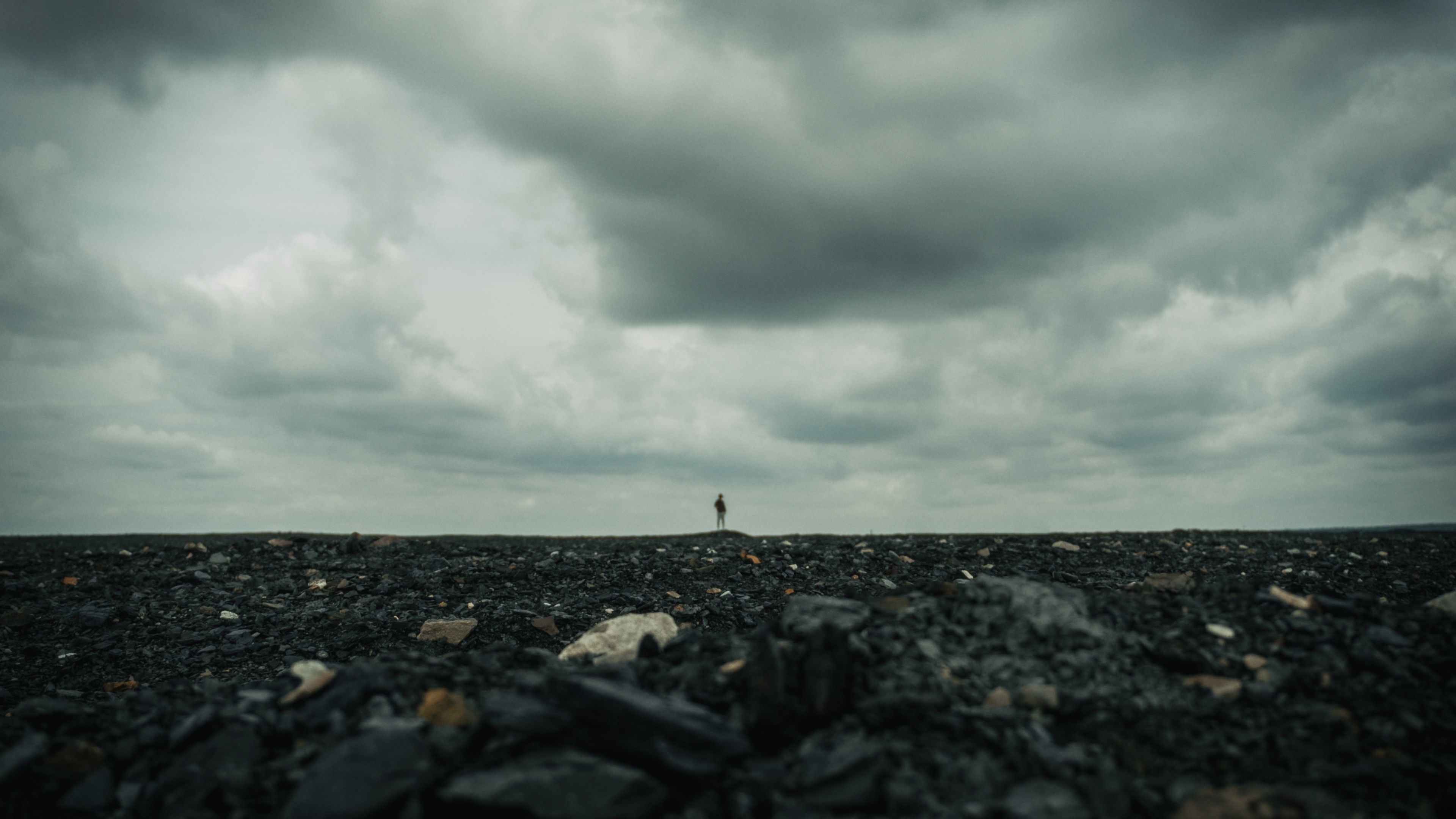 Artistic shot of a black coal mining heap terrain in Poland.