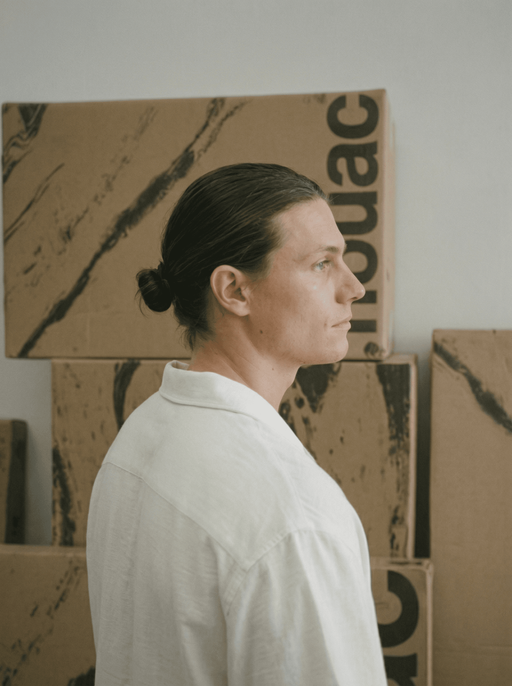 A side profile of a factory worker in a factory