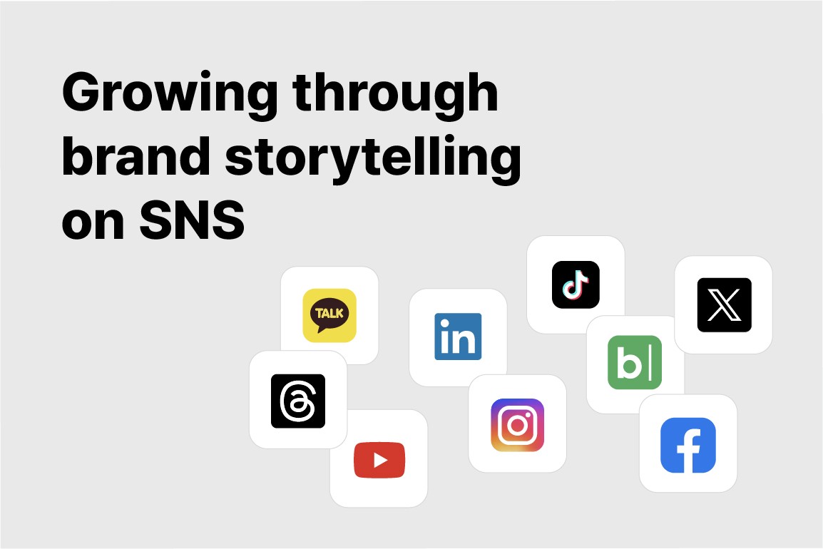 Close-up of lush, dark green leaves, some glossy and wet, against a muted background.