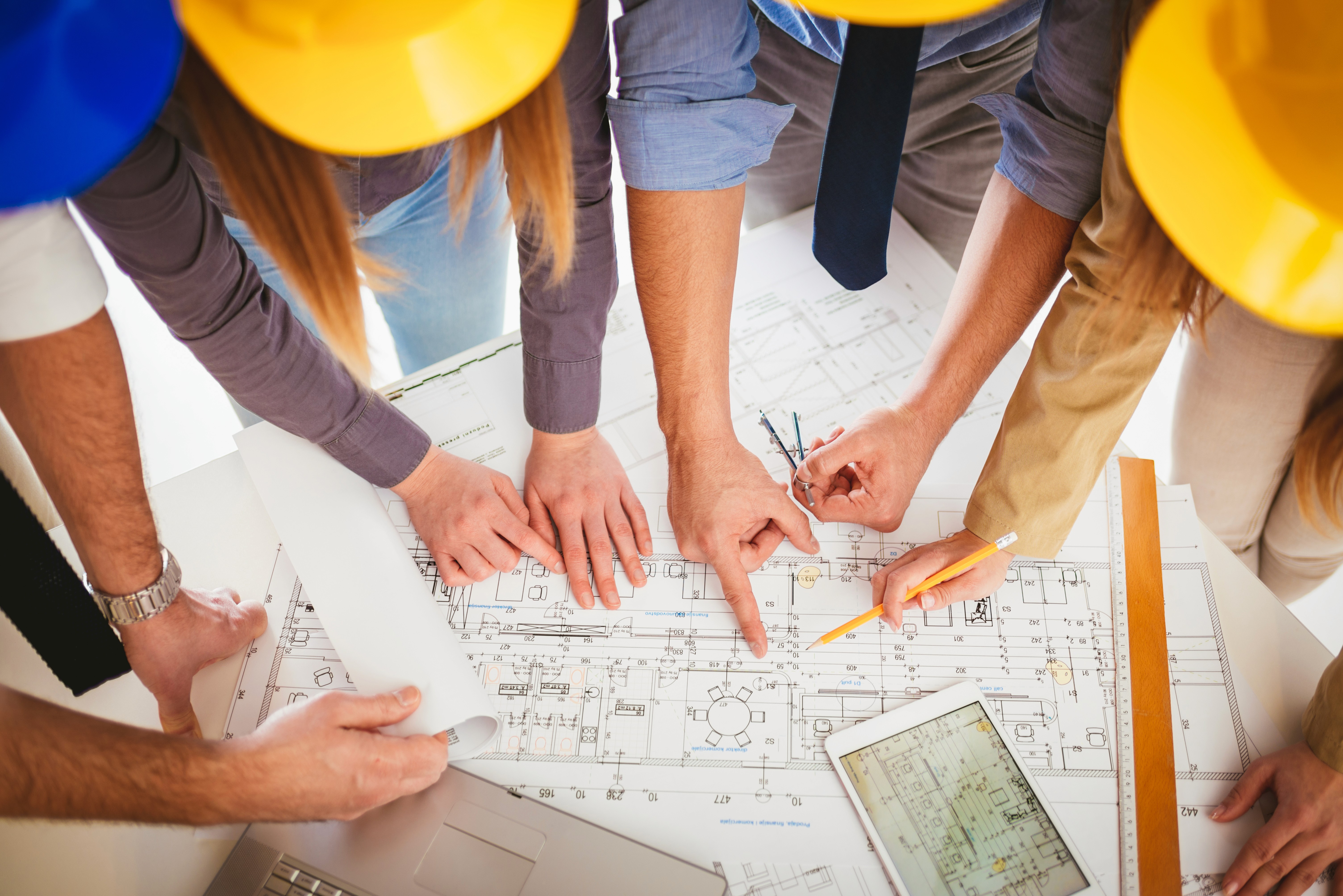 Construction team planning project delivery and commercial growth, representing construction marketing, construction digital marketing, and marketing for construction companies.