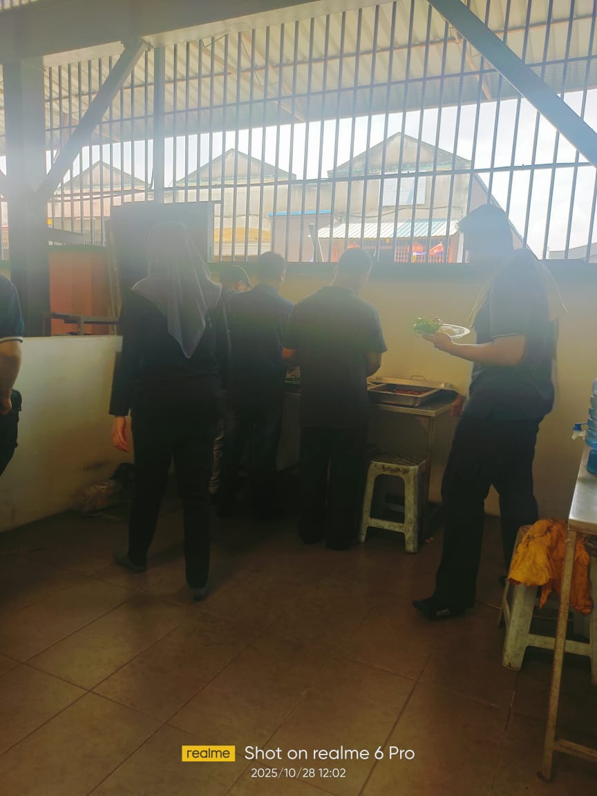 Autofill staff serving and selecting food at the buffet during the team celebration.
