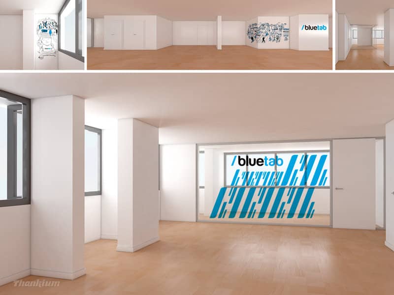 Oficina moderna y luminosa con suelos de madera, paredes blancas y decoración de bluetab.