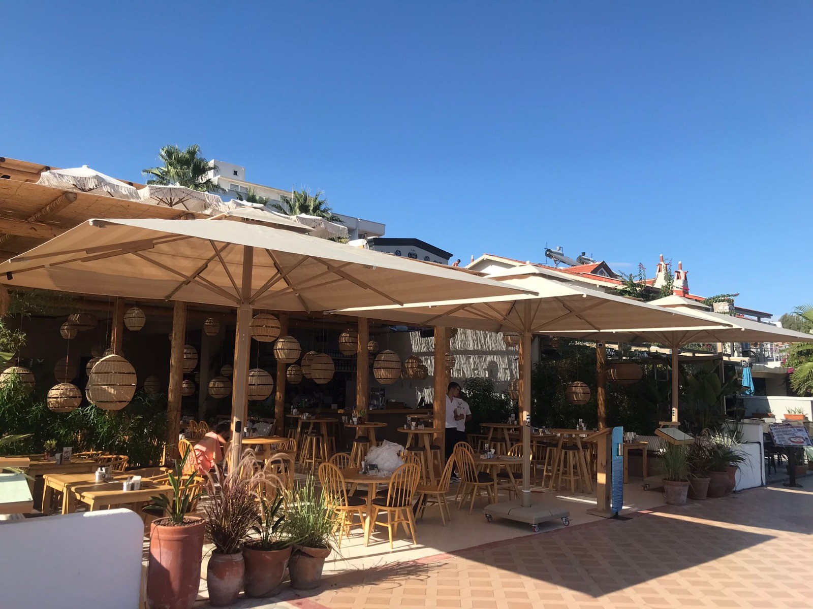 two people looking at a tablet and smiling