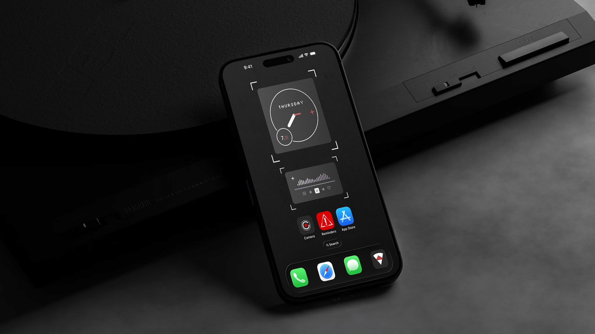 image of a smartphone leaning on top of a record player