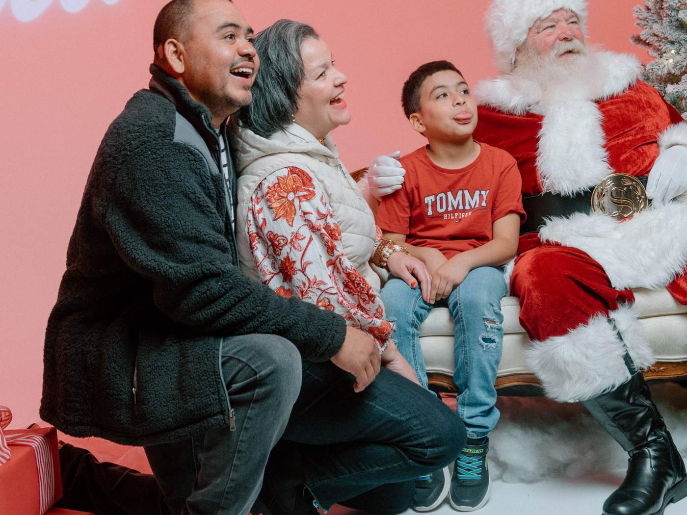 A family with Santa at Christmas Fest