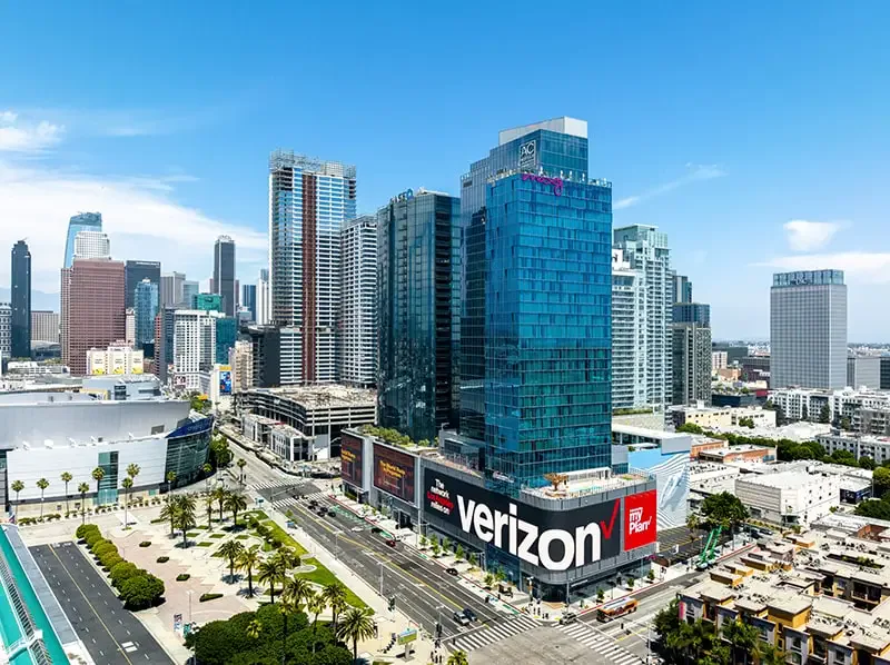 black laptop computer on bed