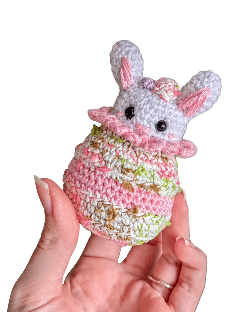 A handcrafted knitted hedgehog toy featuring a soft cream-colored body and intricately detailed, textured brown spines, perfect for children and collectors.