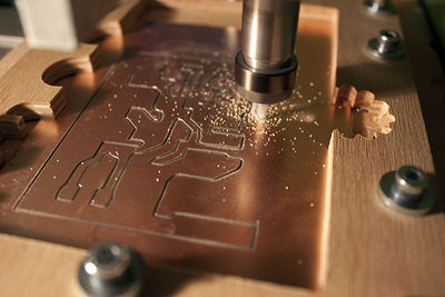green chairs under umbrellas on shore