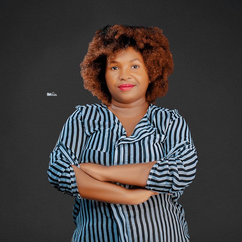 Thandi Mtemang'ombe, co-founder of the Women of Satoshi Cooperative in Malawi, posing with arms crossed