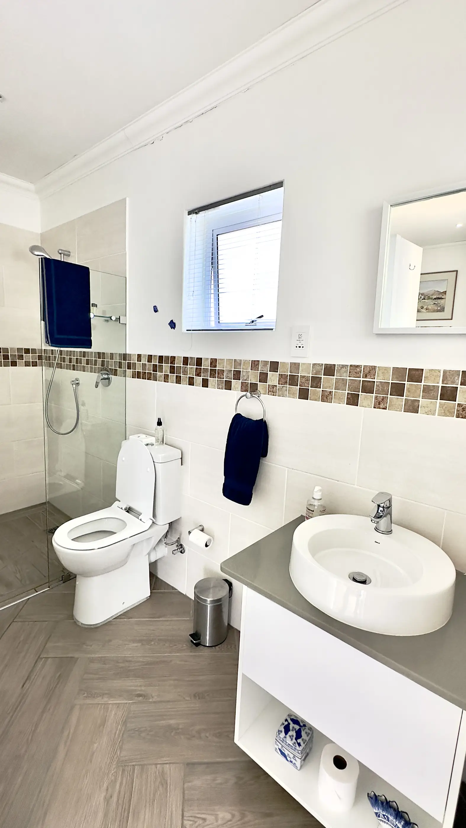 Toilet and shower area in our Escape to 8 room.