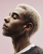 A side-shot of a model with blonde hair