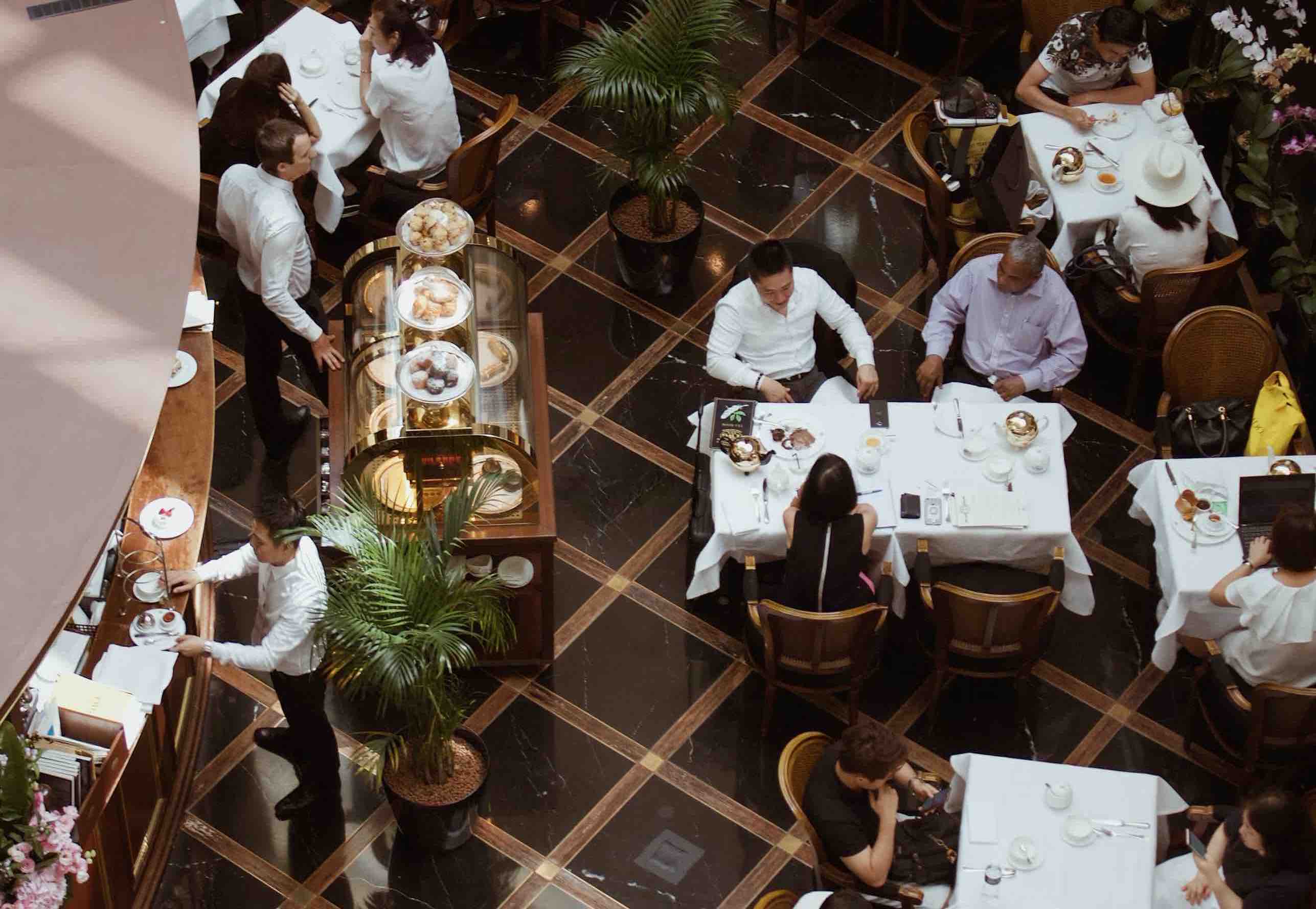 Overhead photo of diners dining in a restaurant.