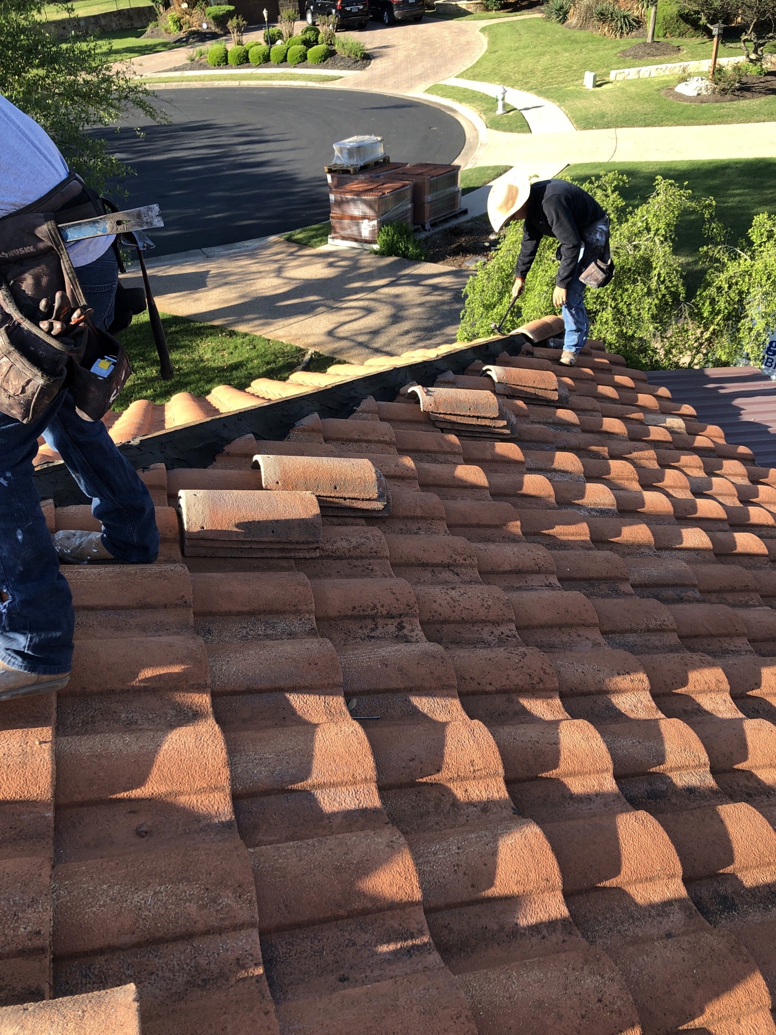 Installing the ridge tiles on a new house in Lakeway Texas. 