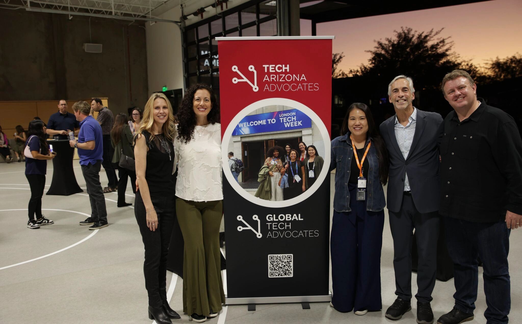 a black and white living room with a large tv