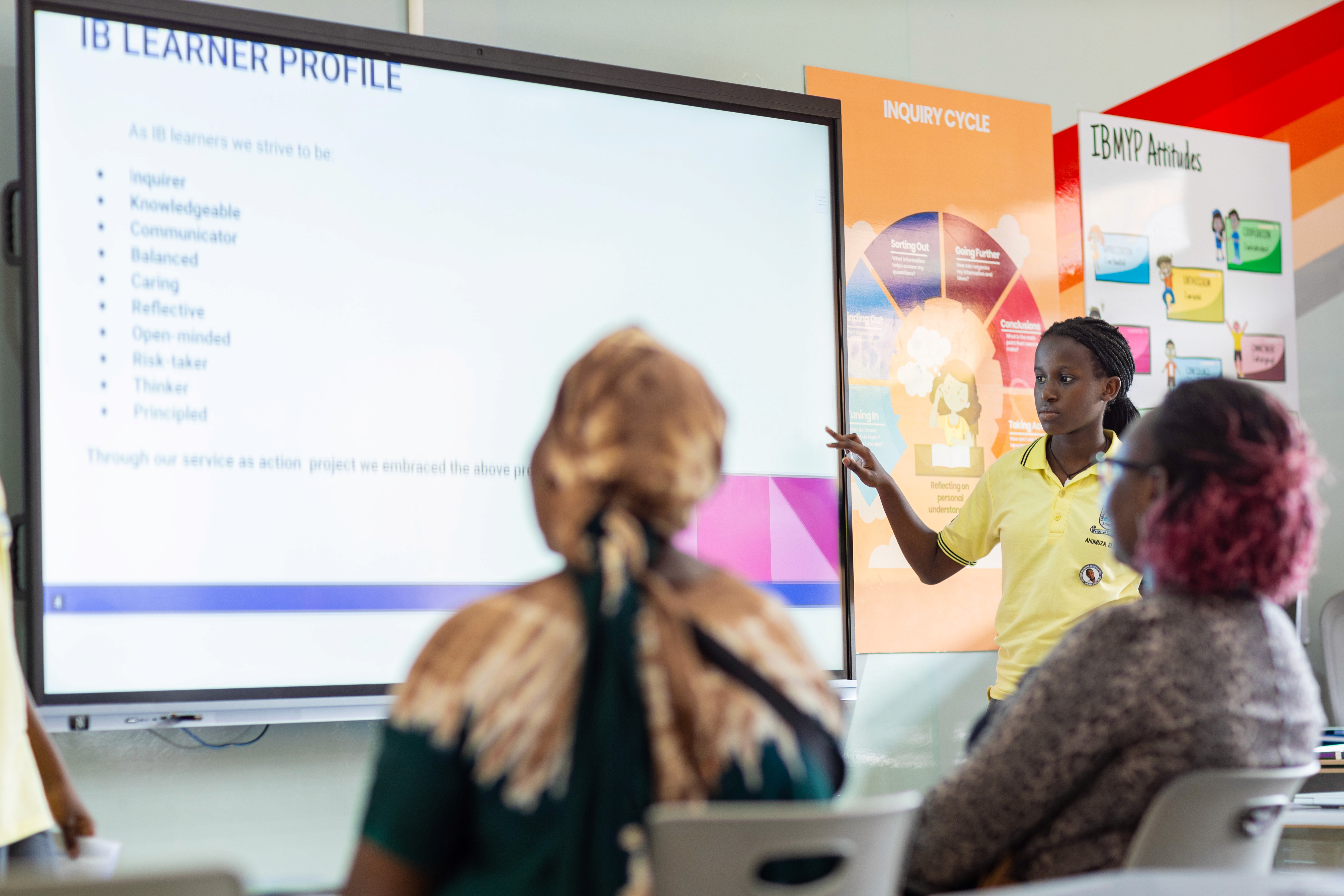 Three schoolgirls are doing homework together