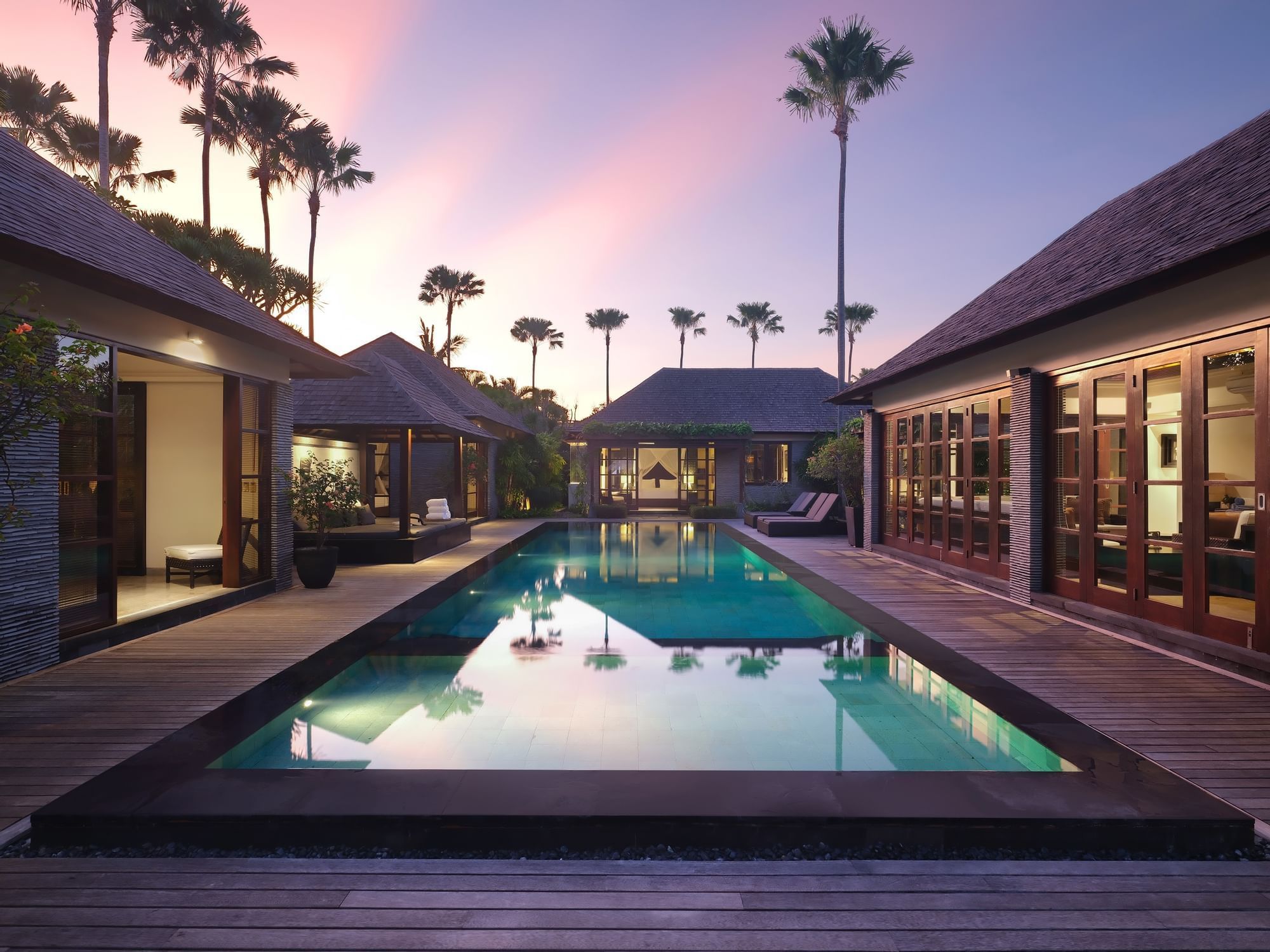 Private luxury villa with lap pool at sunset, a signature Seminyak property listed by our agency.