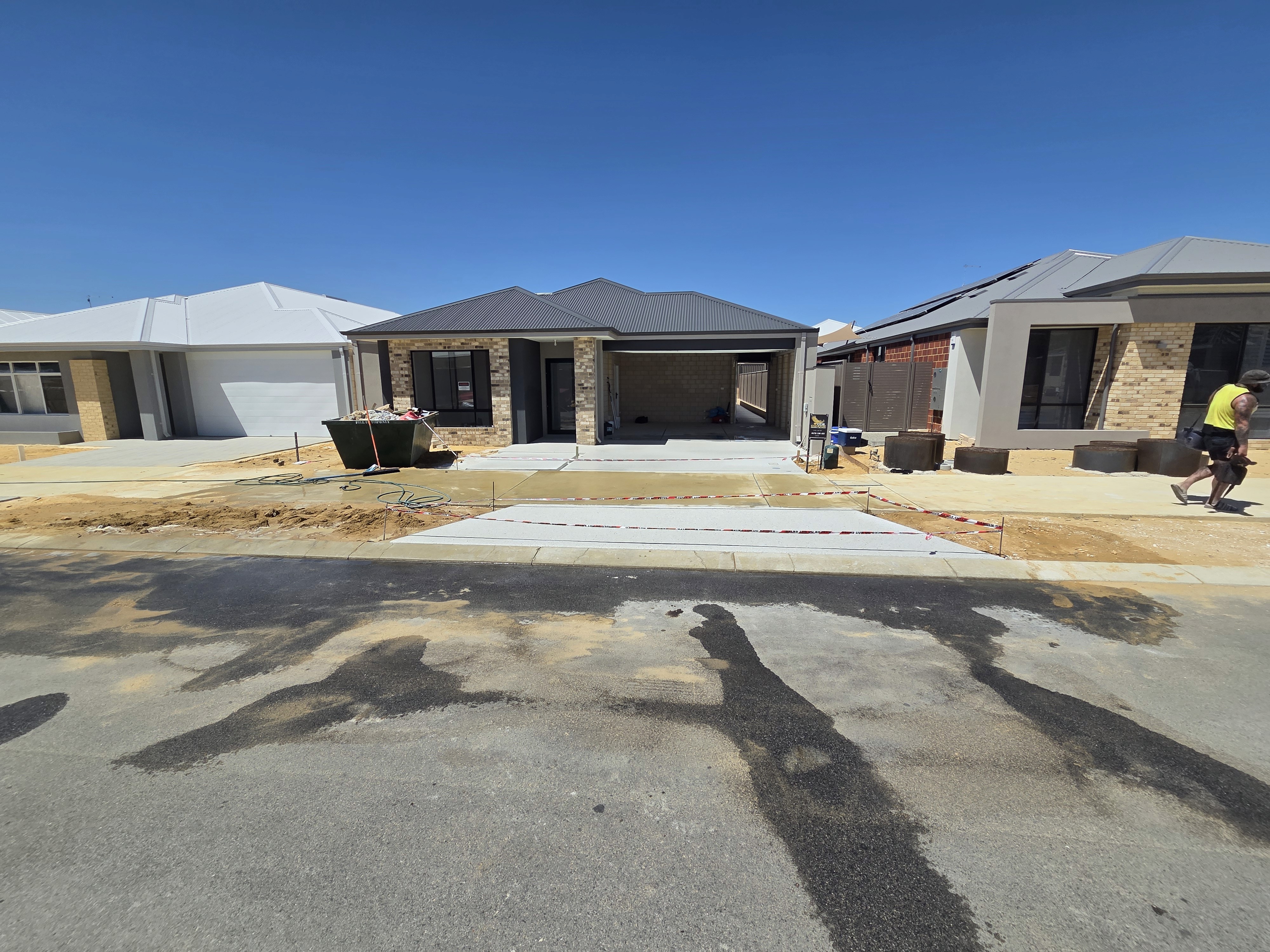 Rachel, personal trainer, looking to the side confidently in a fitness studio