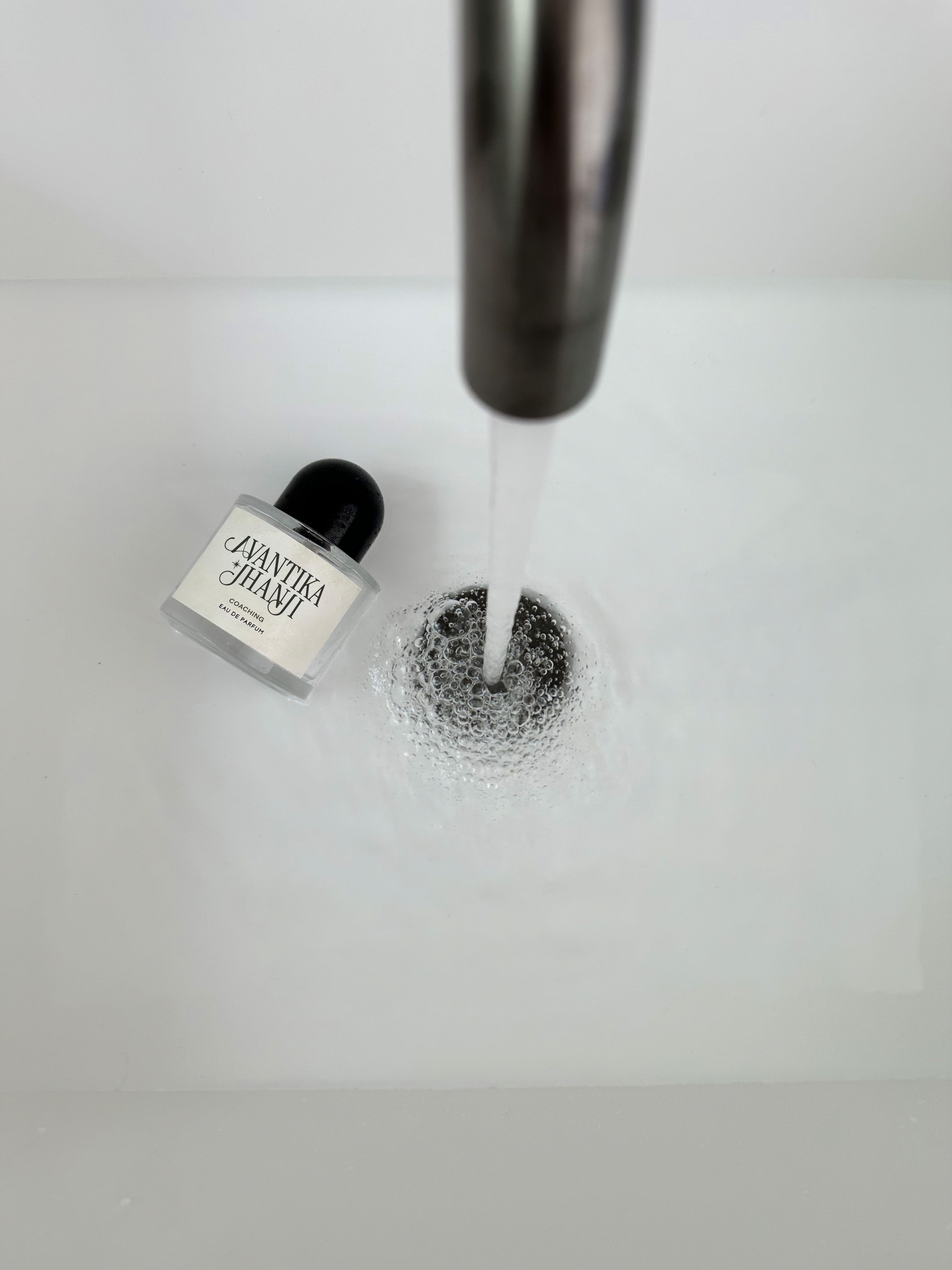 Avantika Jhanji Coaching Logo Design mockup with coffee and a journal from Point Made Studio's Brand Design