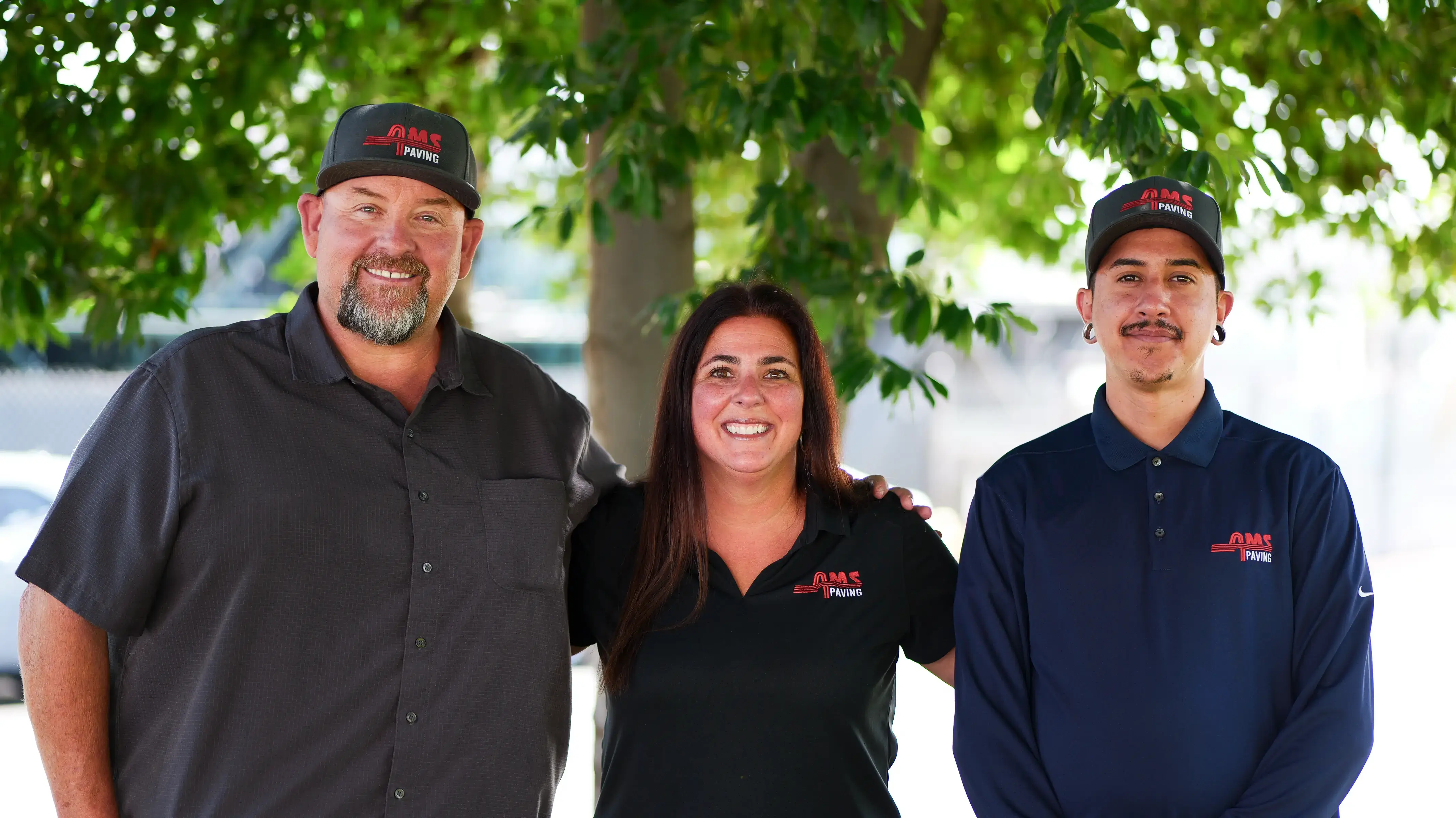 Diverse office team posing for photo together