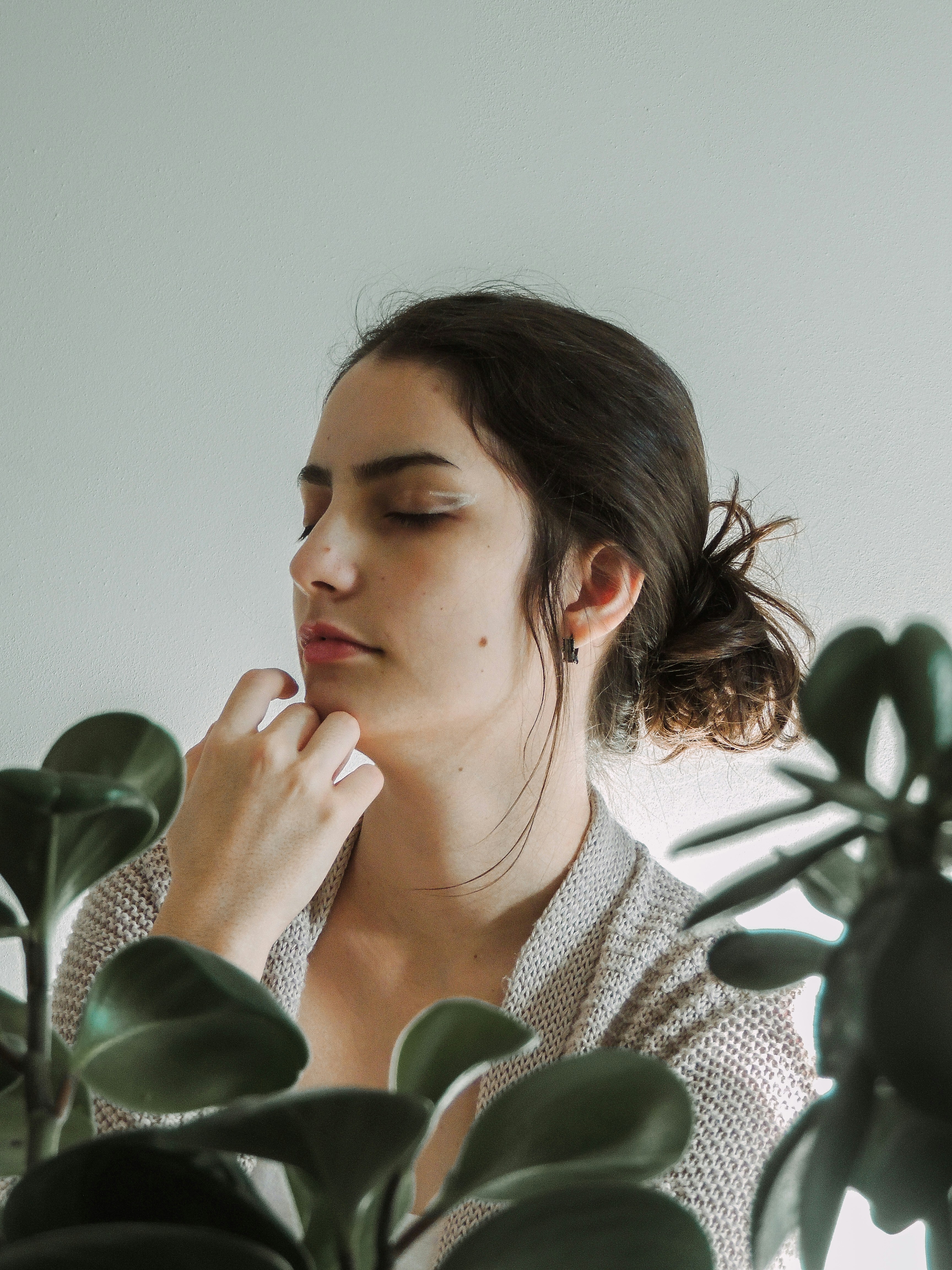woman in white and black striped shirt