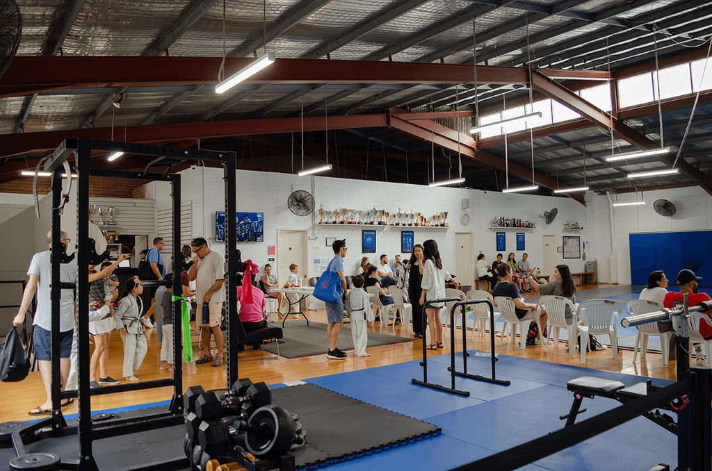 Gracie Sydney training facility with gym equipment and open mat area