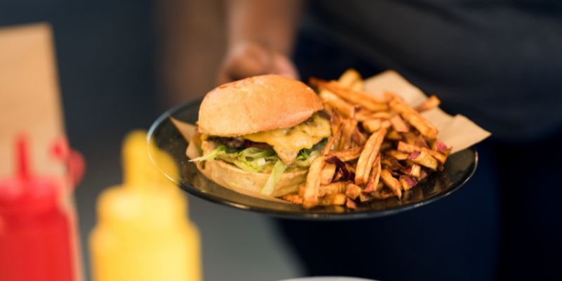 A plate of burger being served