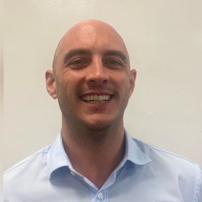 Portrait image of recently hired tech professional