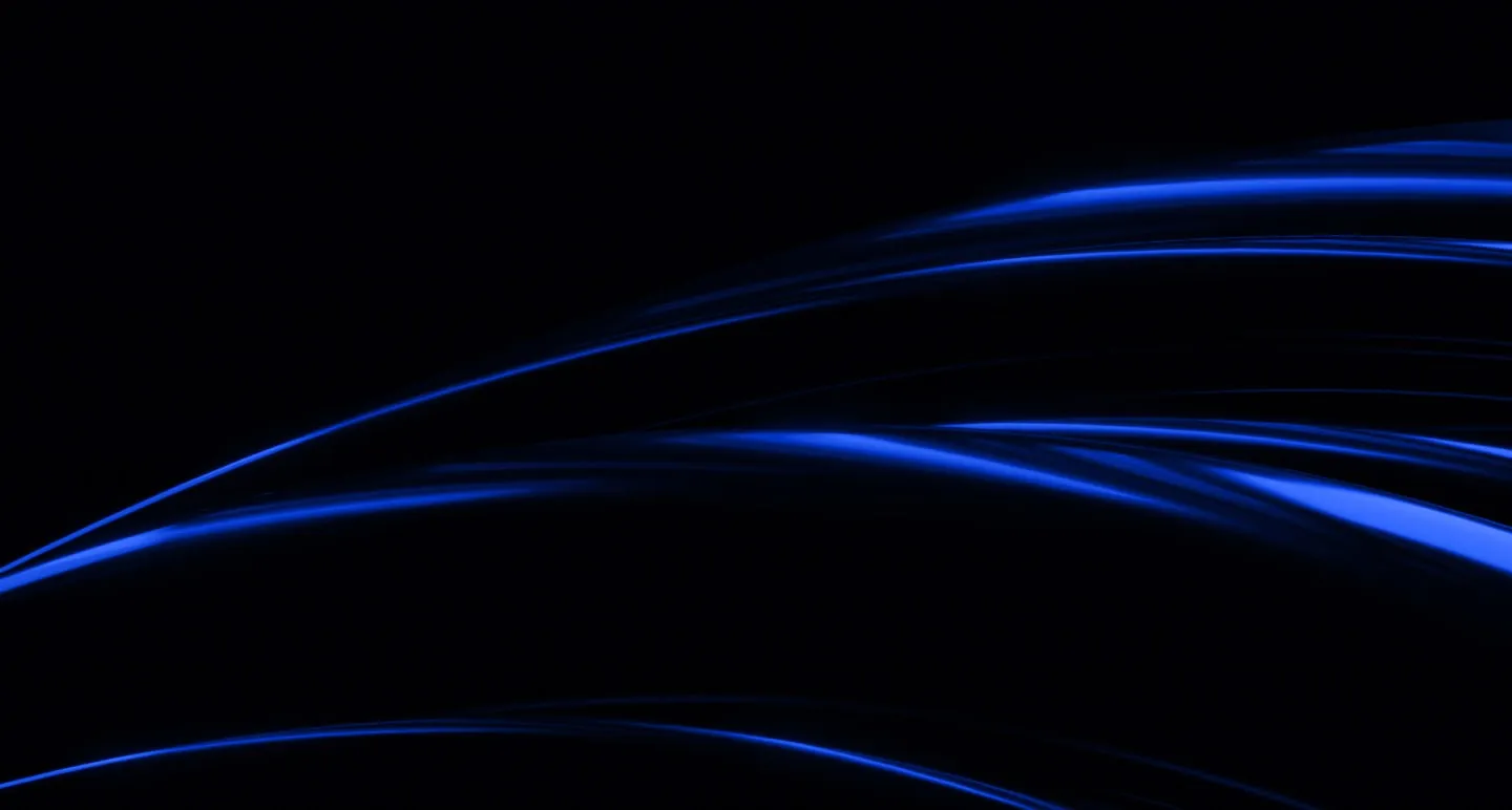 This image features smooth, flowing arcs of vibrant blue light set against a black background, creating a sleek and futuristic abstract pattern.