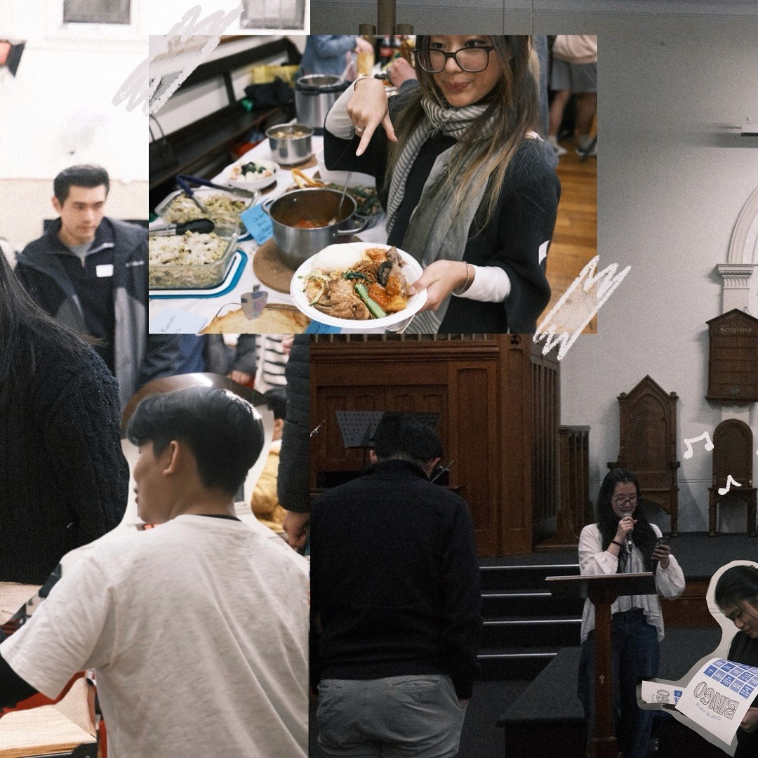 A restaurant interior featuring marble countertops, brown leather chairs, wood-paneled walls, and round pendant lights hanging above a bar set with wine glasses.
