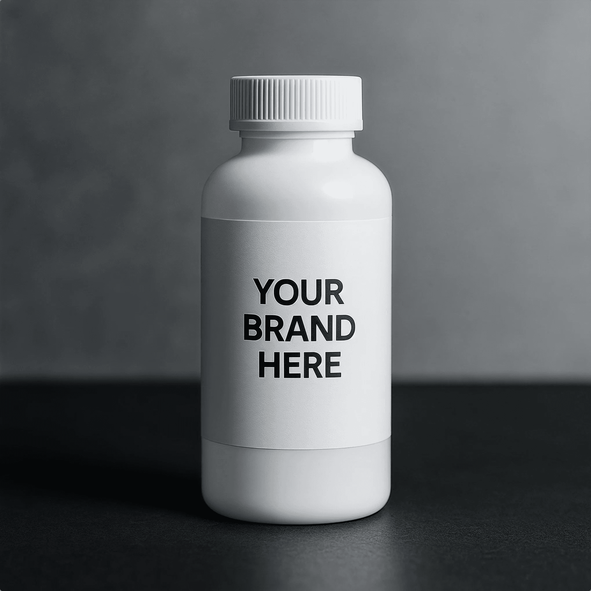 White plastic supplement bottle with blank label displaying “Your Brand Here” on a gray background for private label