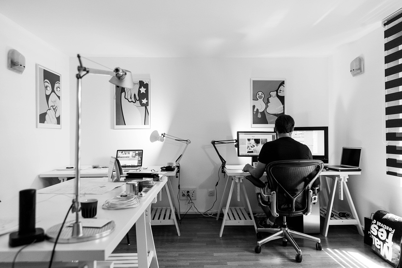 man sitting at a home office