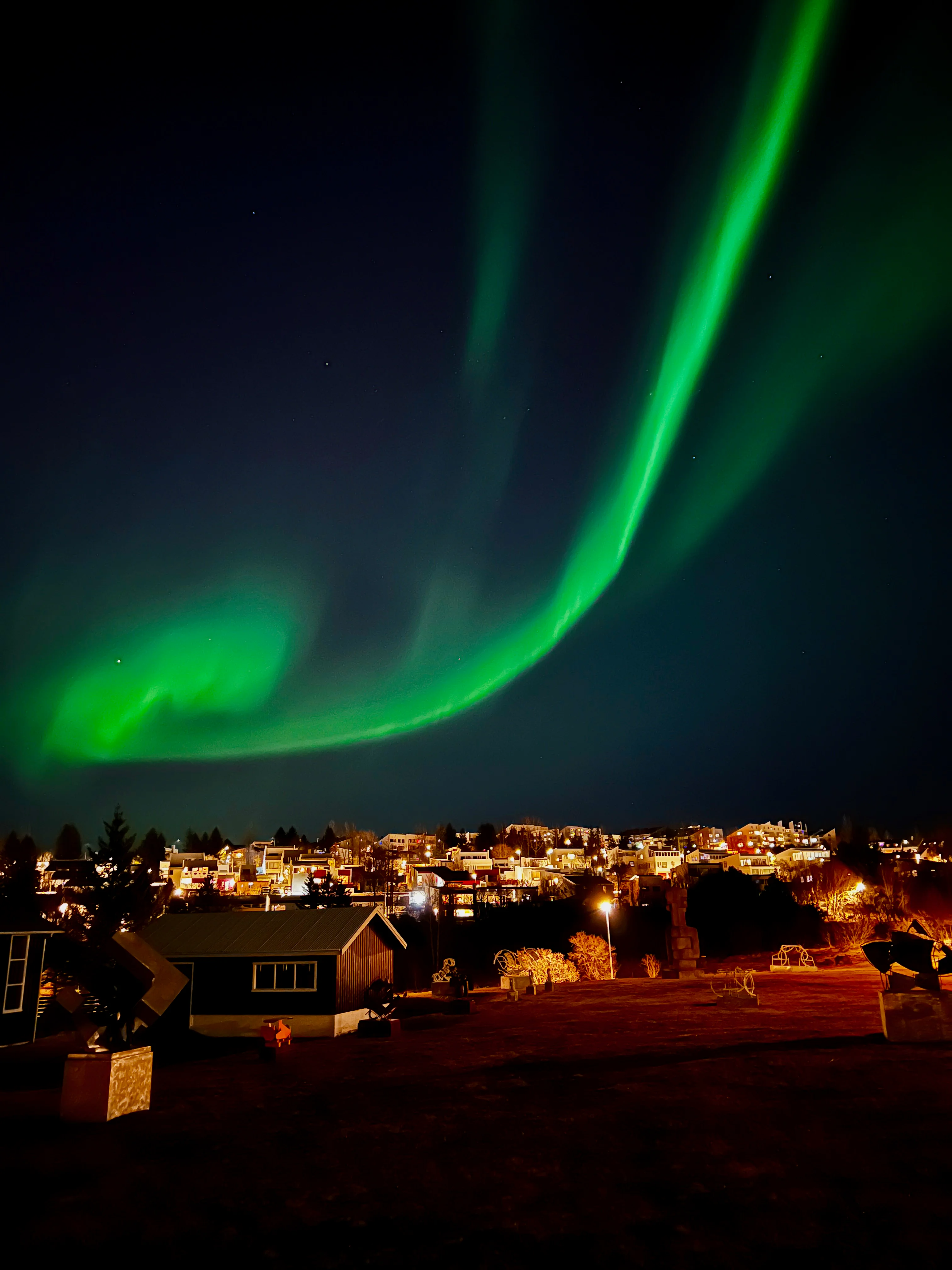 Northern Lights over Reykjavík suburbs. Photo: Parker O'Halloran