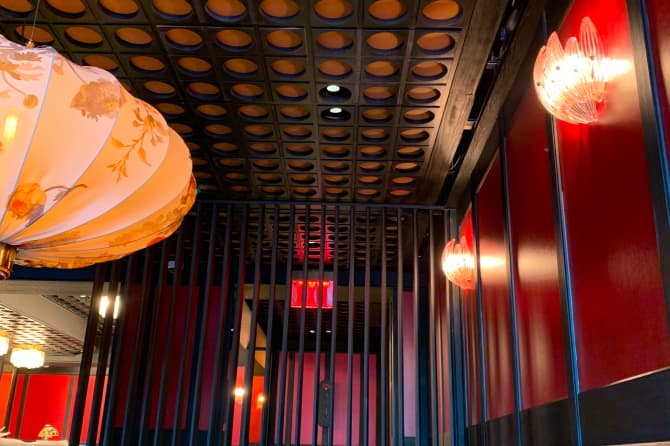 Another shot of the ceiling and the adjoining wall covered in mirrors