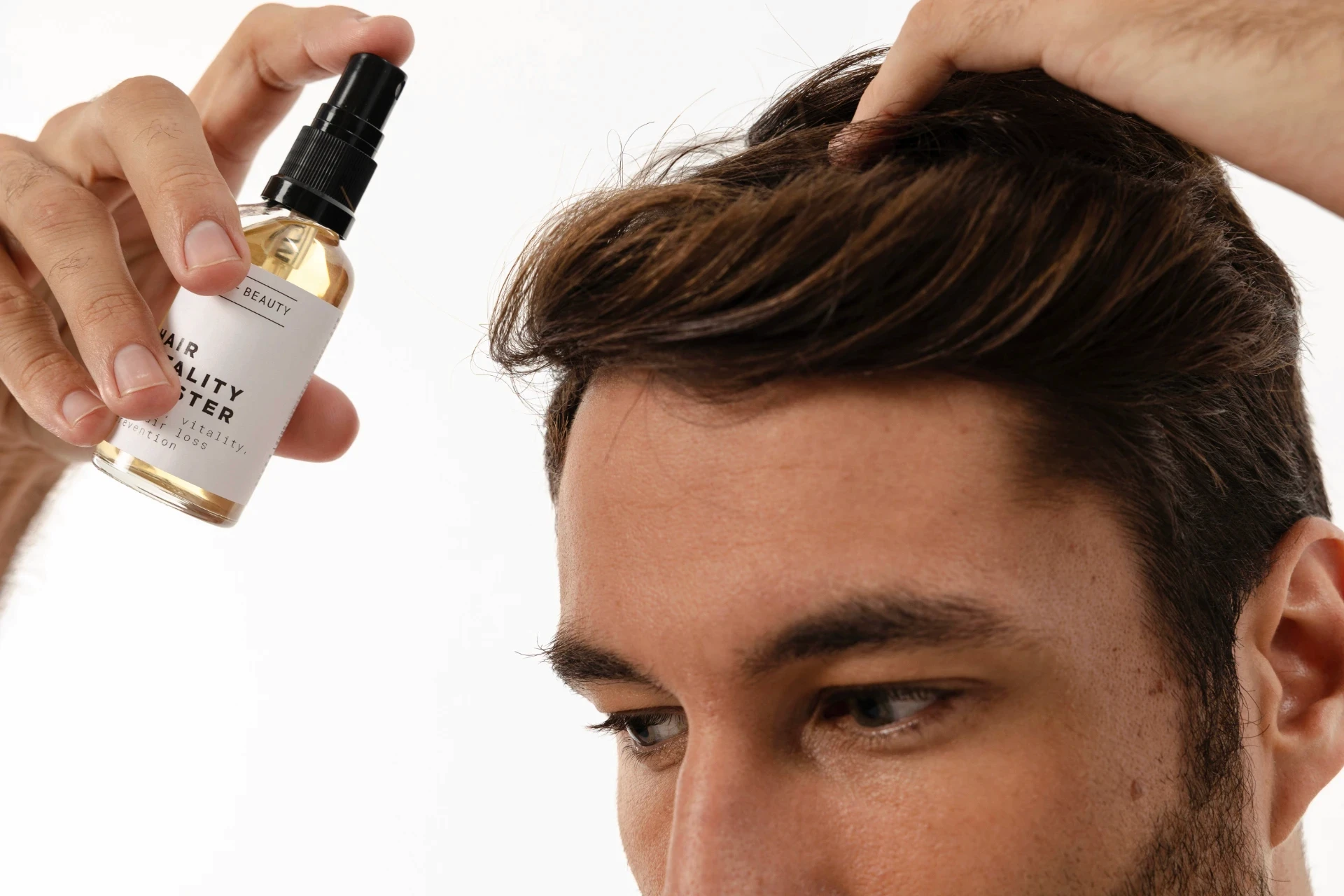 Man using hair product. Hire graphic designer Barcelona for product branding.