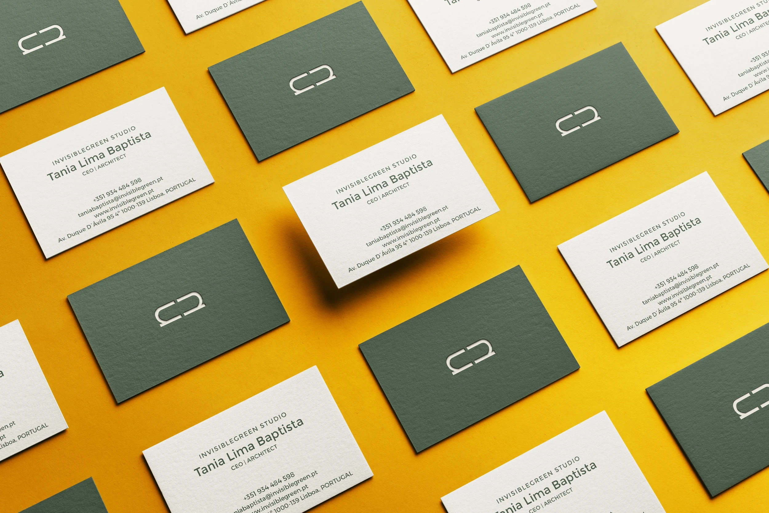 Minimalist business card design for Invisible Green Architecture Studio with clean typography and contemporary brand identity system.