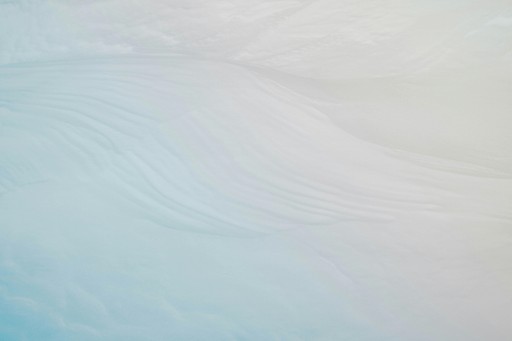 white sand under blue sky during daytime