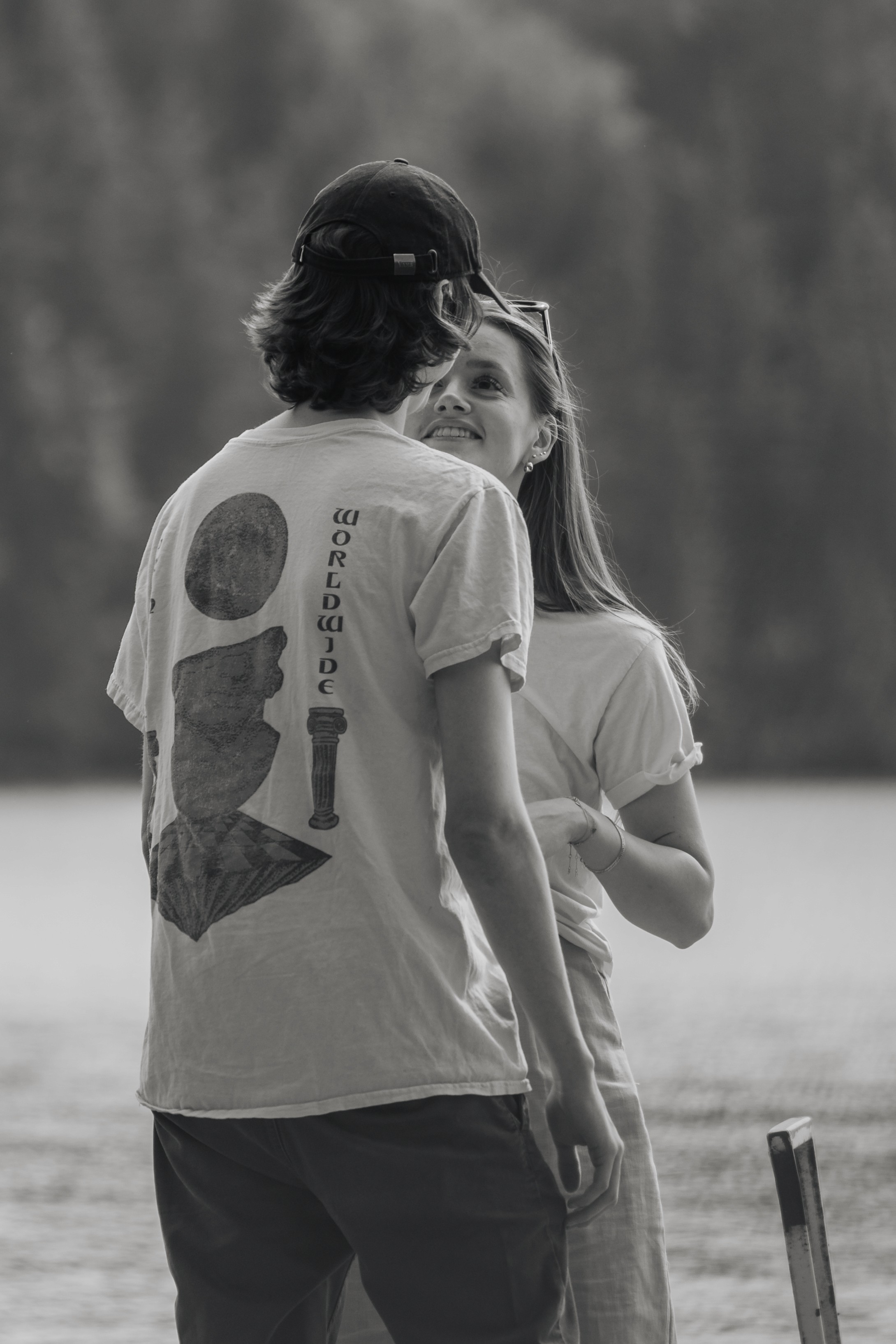 Romantic engagement photography Brandon couple embrace Manitoba Trident Studios