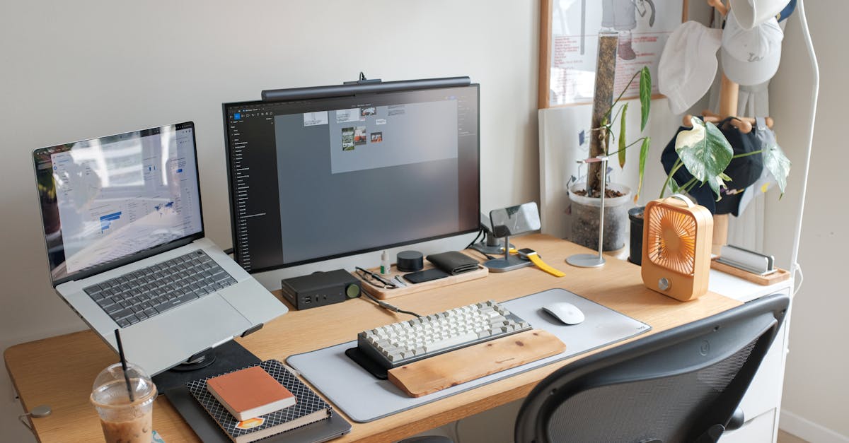 A sleek office setup featuring a laptop, monitor, and stylish accessories enhancing productivity.