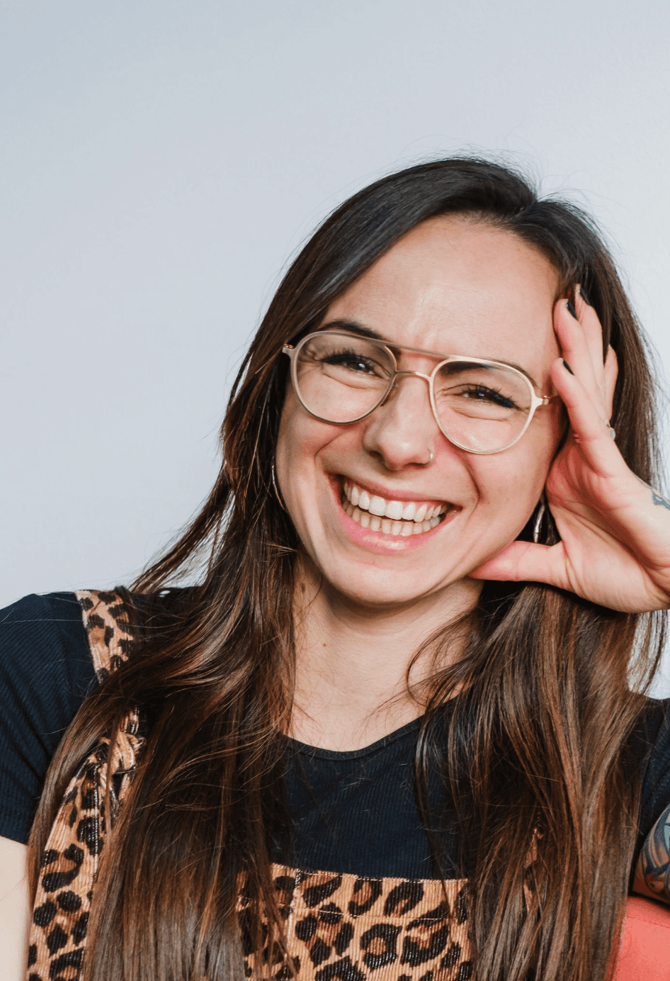 Smiling client celebrating the success of their brand story transformation.