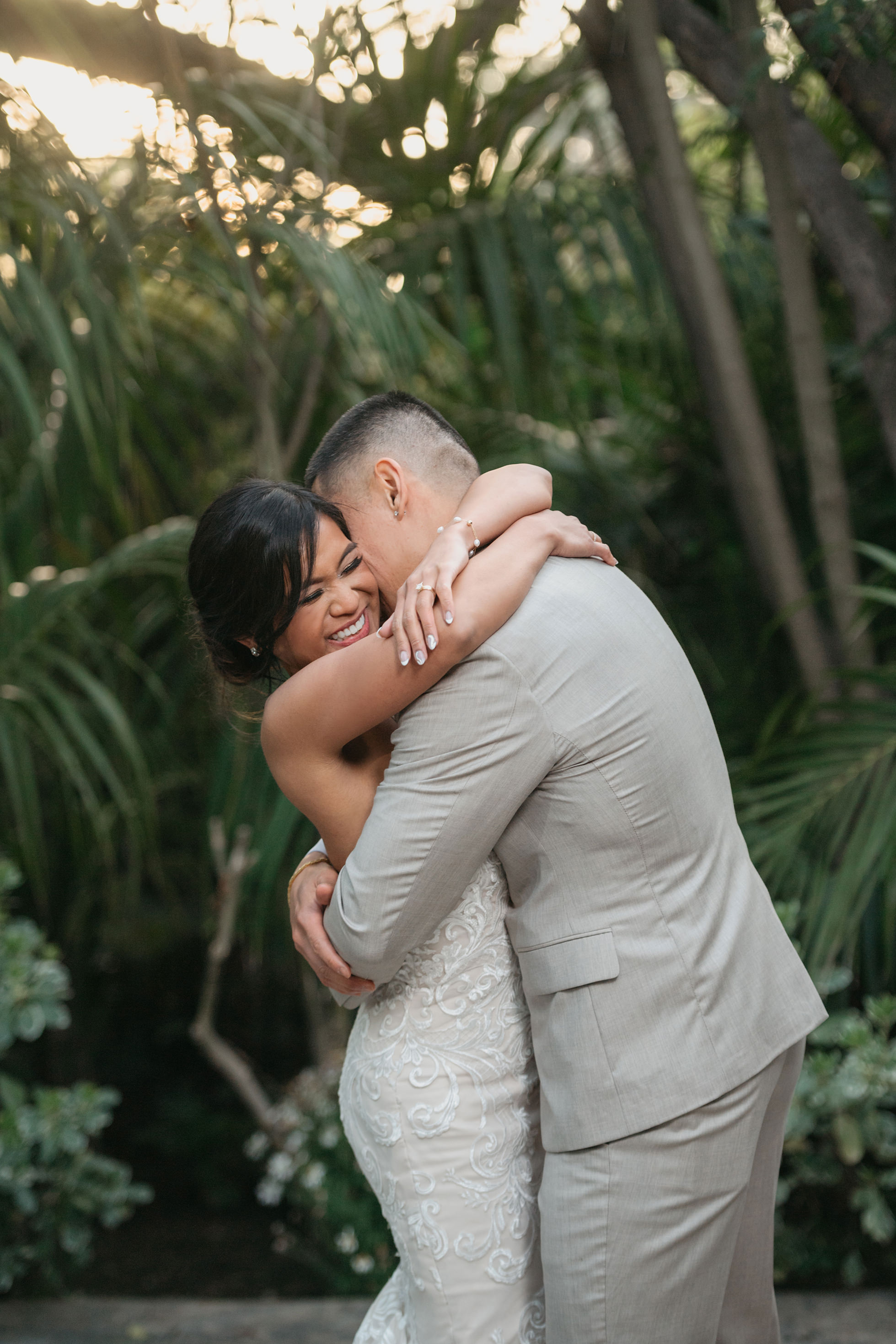 Flat lay wedding details with bouquet, rings, and sparkling bridal heels