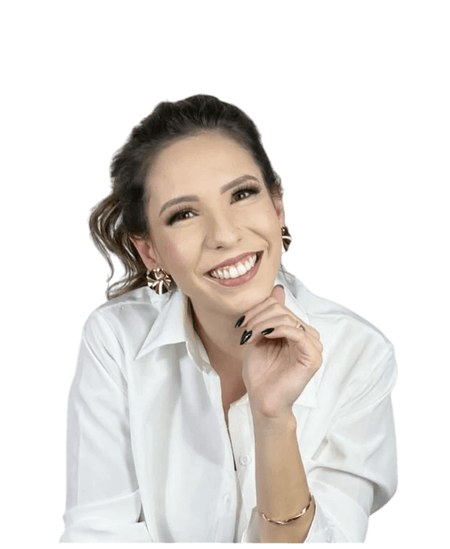 man sitting facing silver MacBook inside room