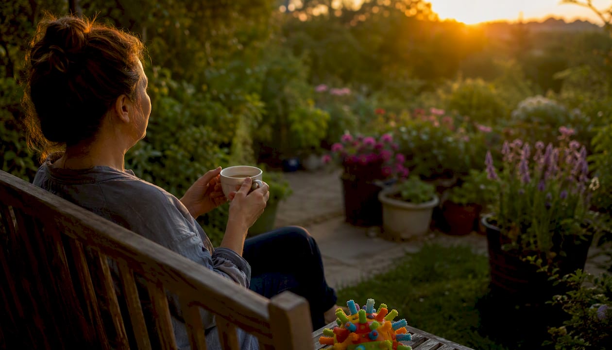 Caregiver resting with tea after respite care