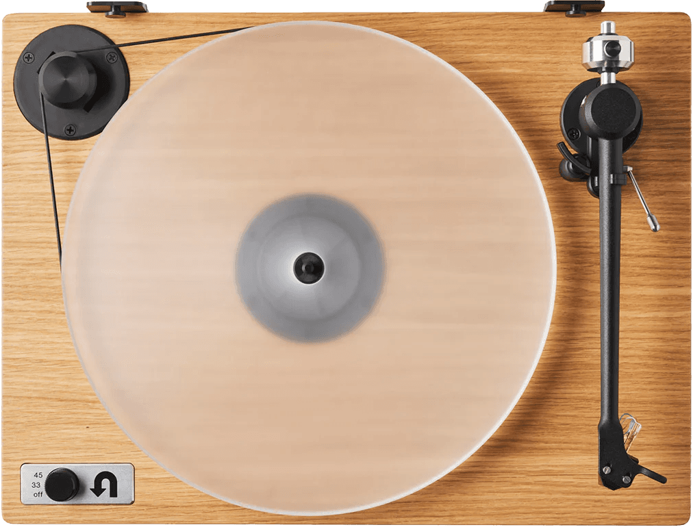 U-Turn Orbit Special turntable shown from above, with an oak plinth, clear acrylic platter and black tonearm.