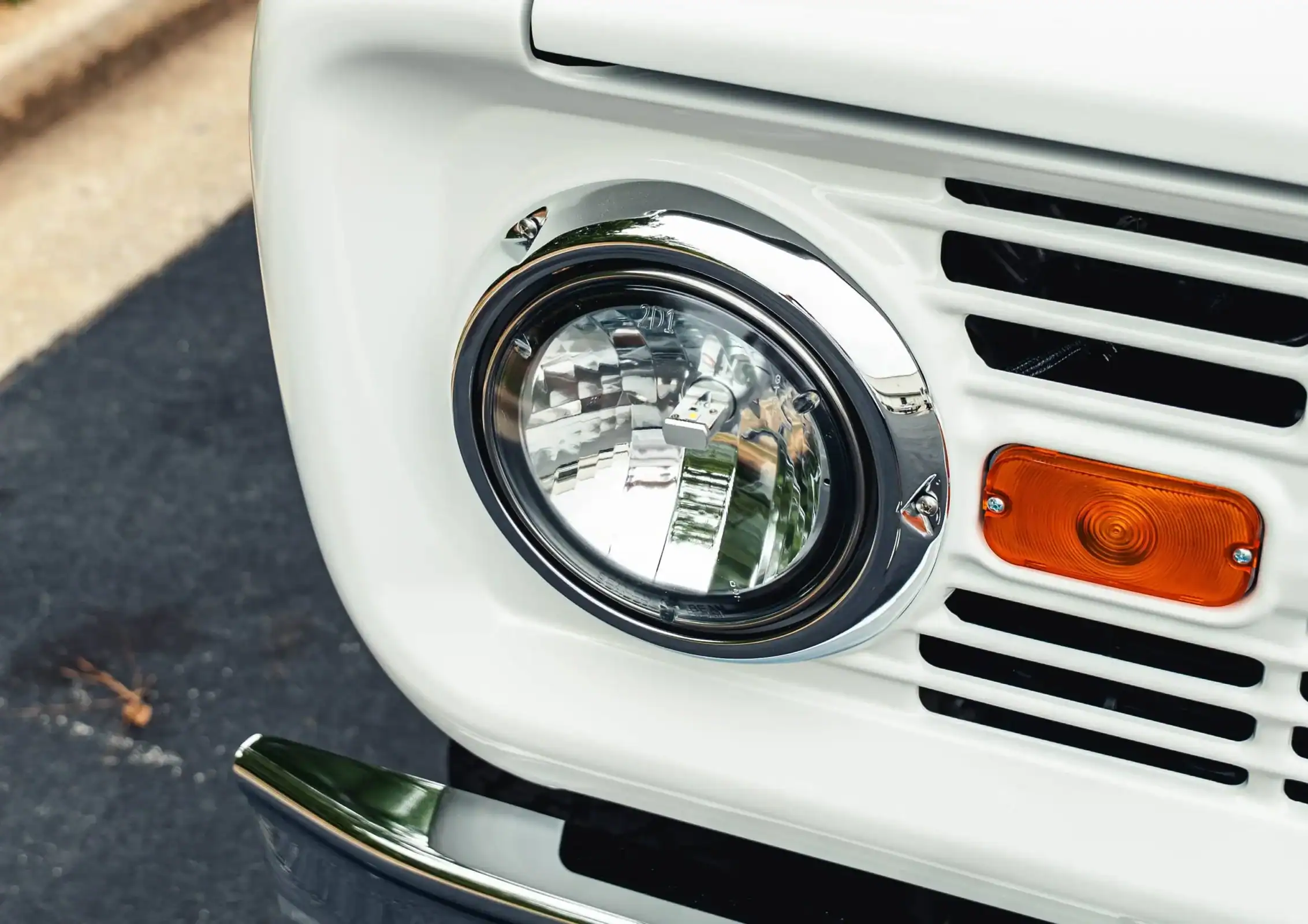 a person swimming in the water with grass