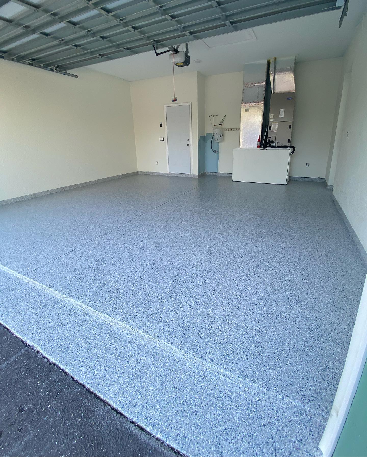 Flake epoxy garage floor in Estero by Custom Coat Epoxy