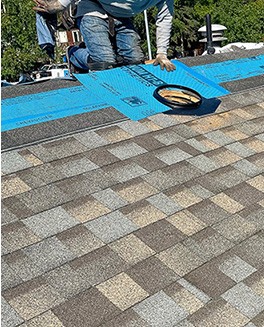 Man working on a roof