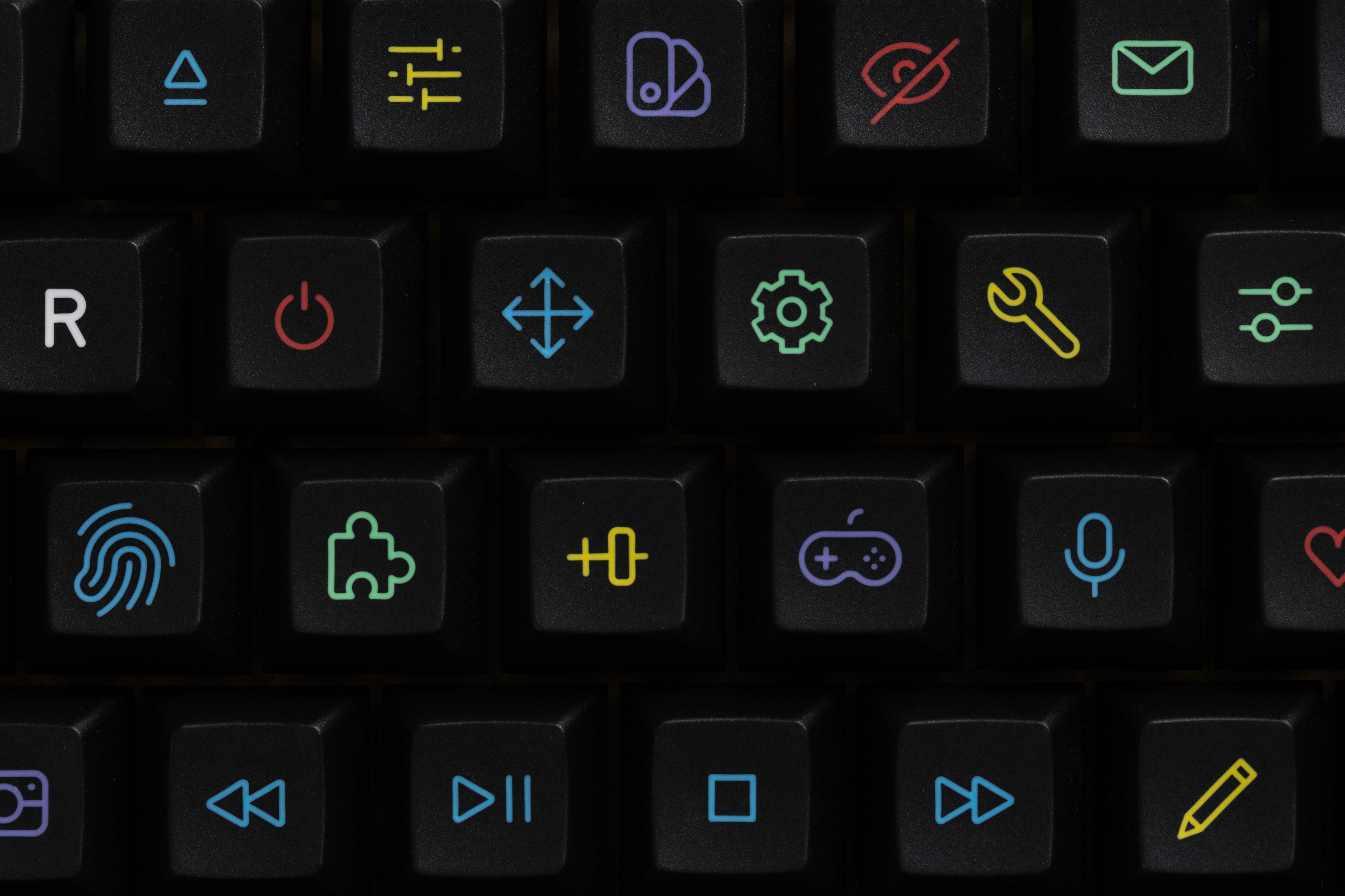 Close up view of KAM playground keycaps on boop65 keyboard