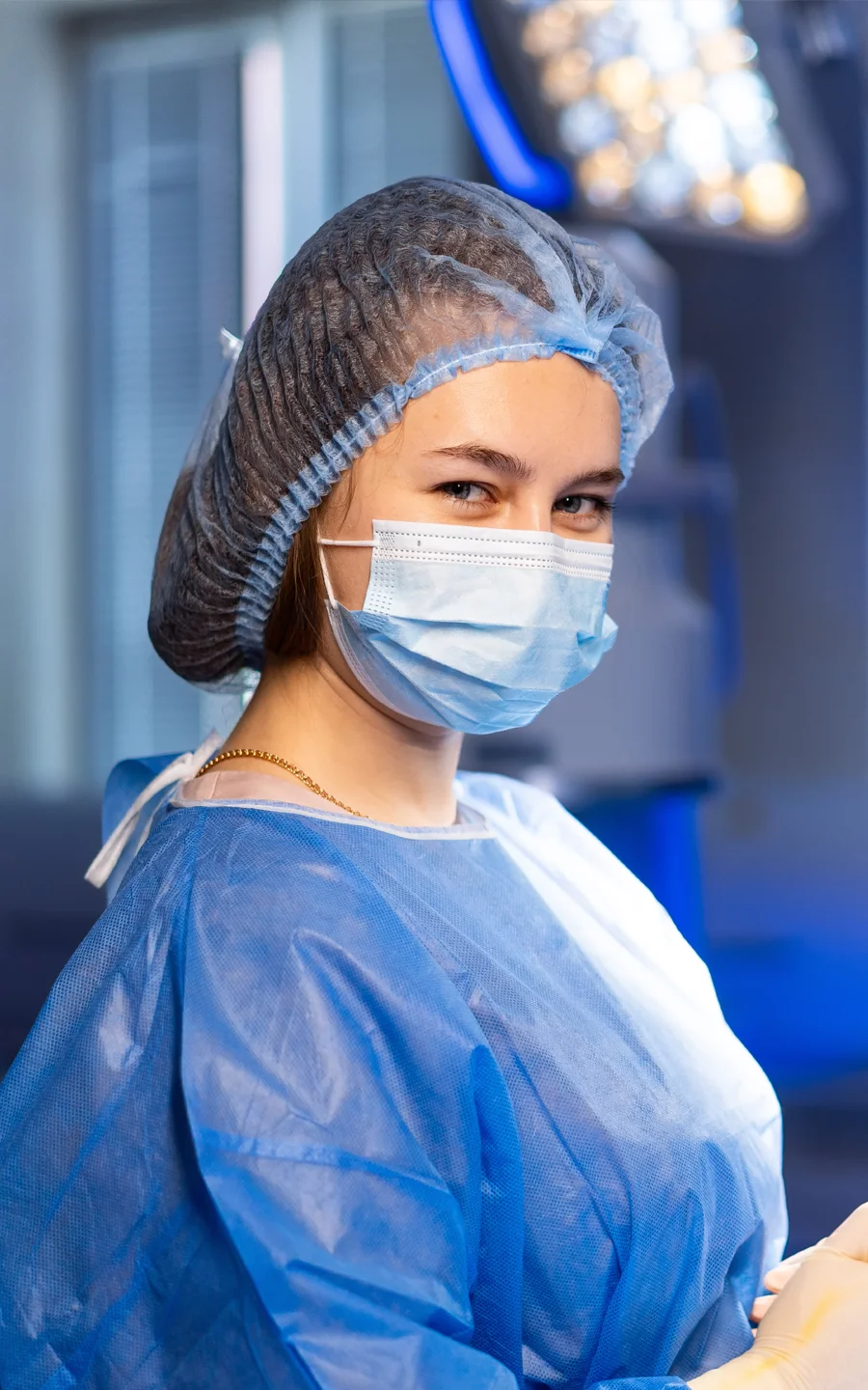 Doctor and Filipino nurse reviewing chart.