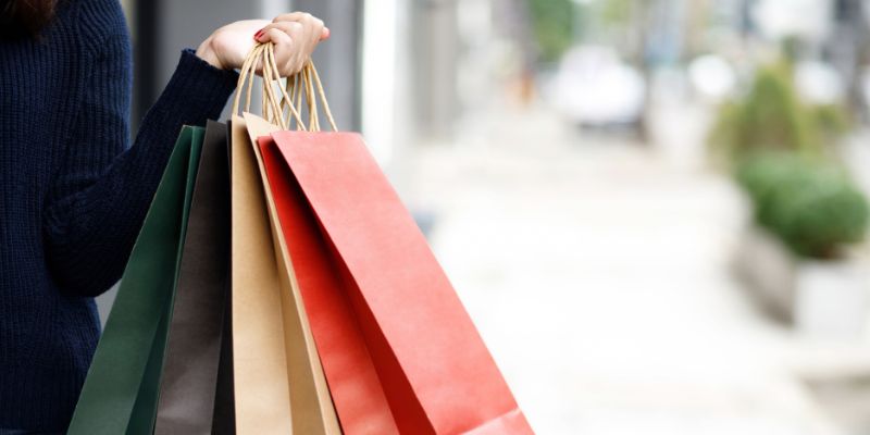 A woman holding shopping bags