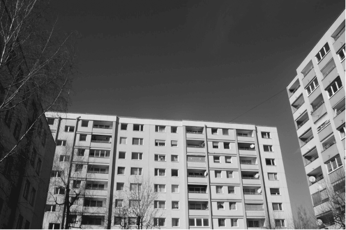 A black and white image showing some buildings